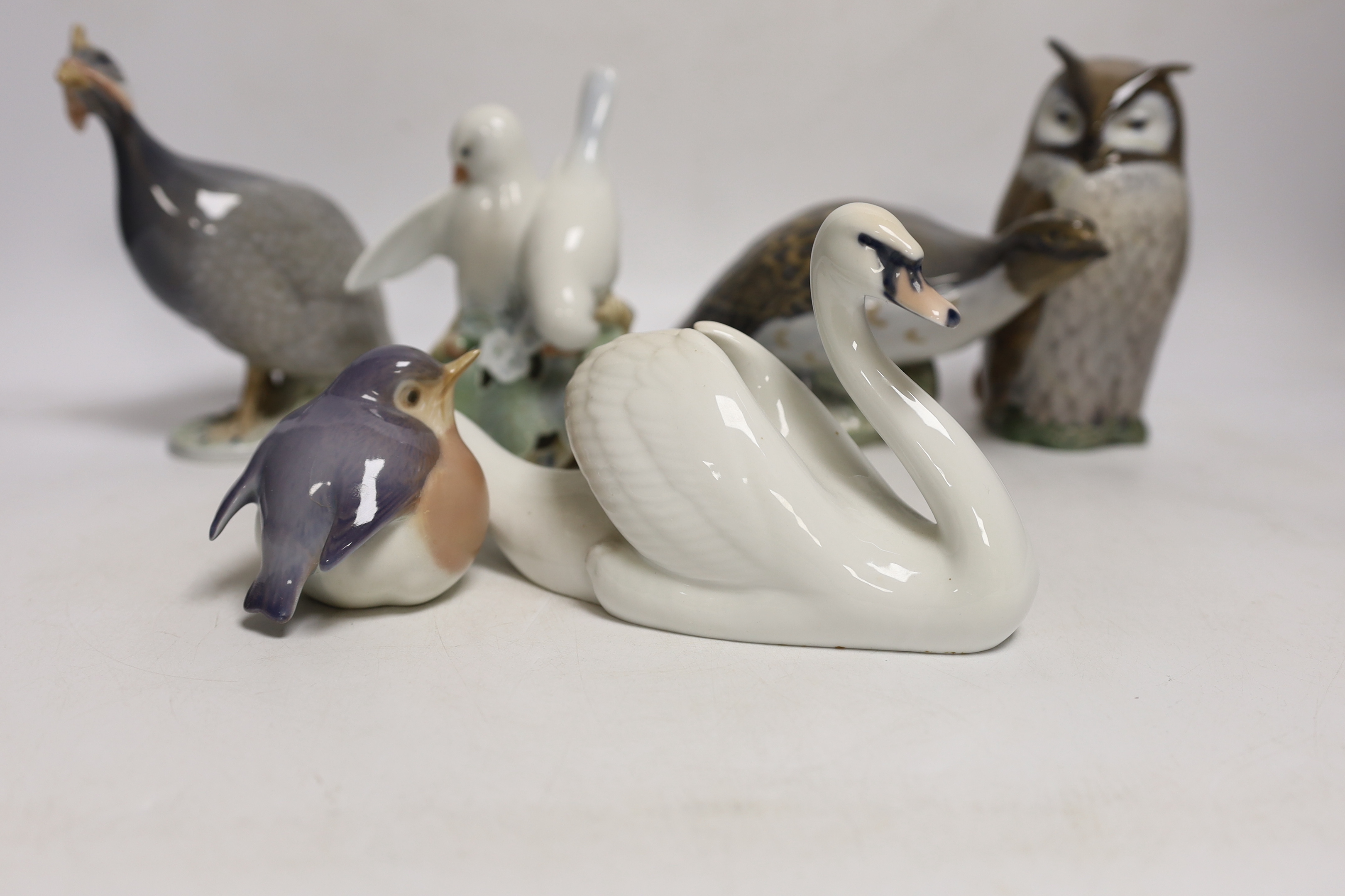 A six Royal Copenhagen birds including a swan and an owl, largest 17cm wide